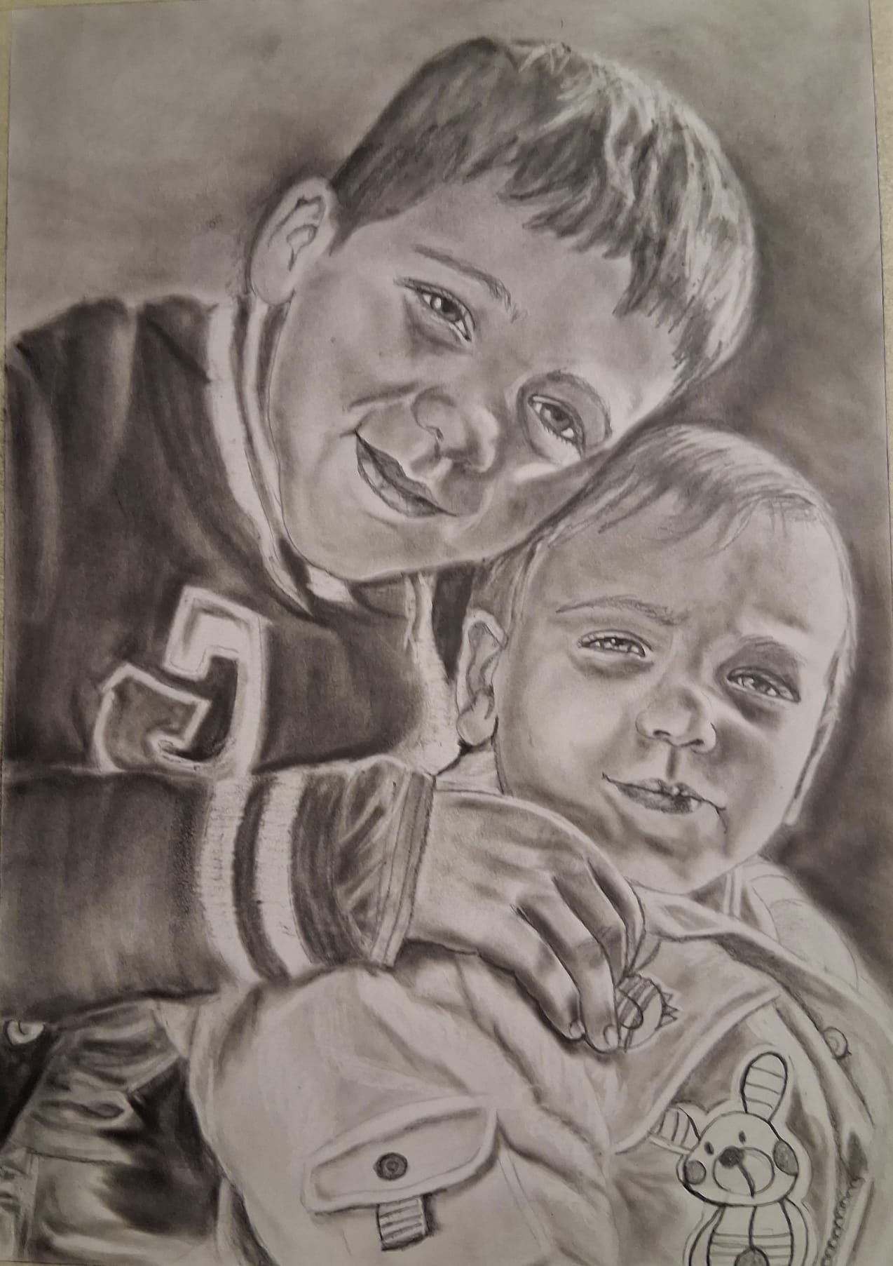 Charcoal portrait of two young brothers
