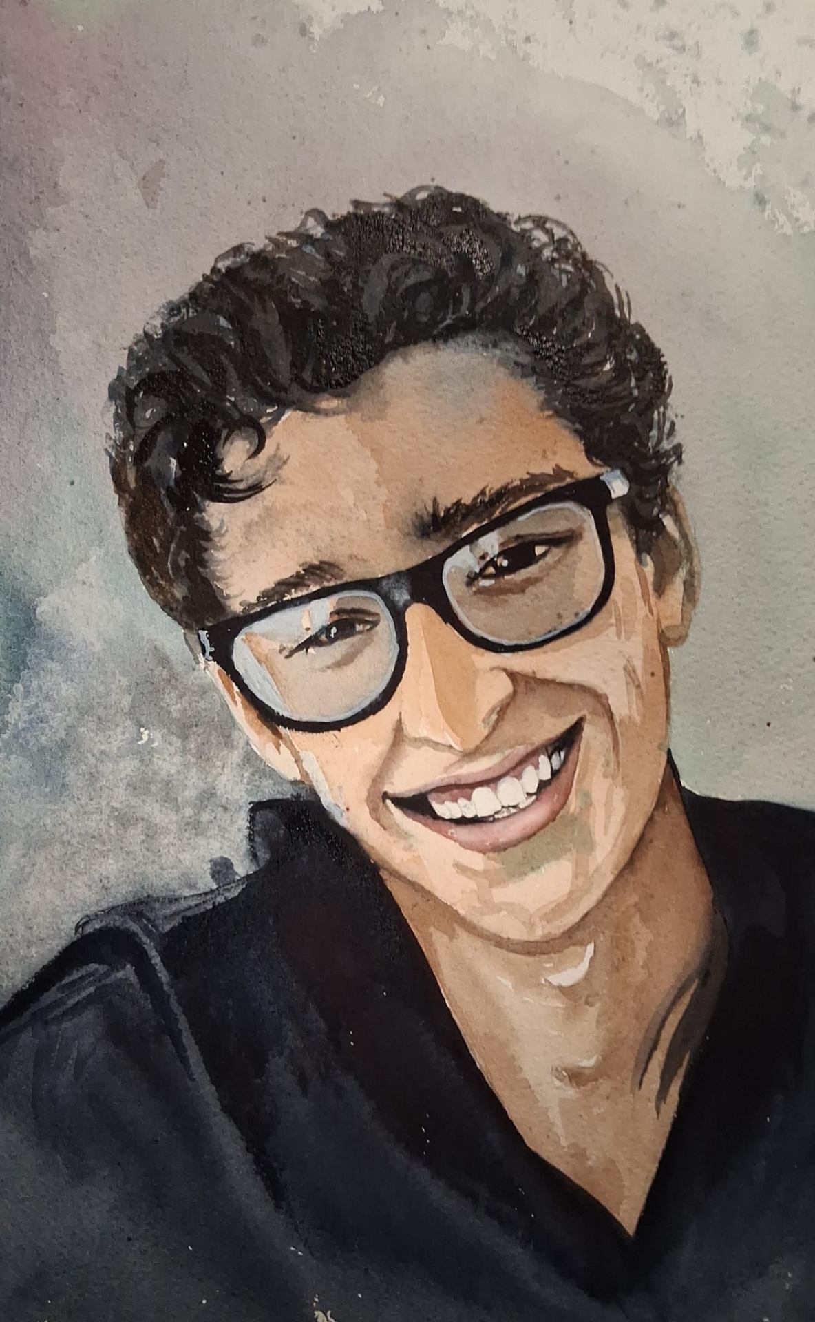 Watercolour portrait of a young man with glasses